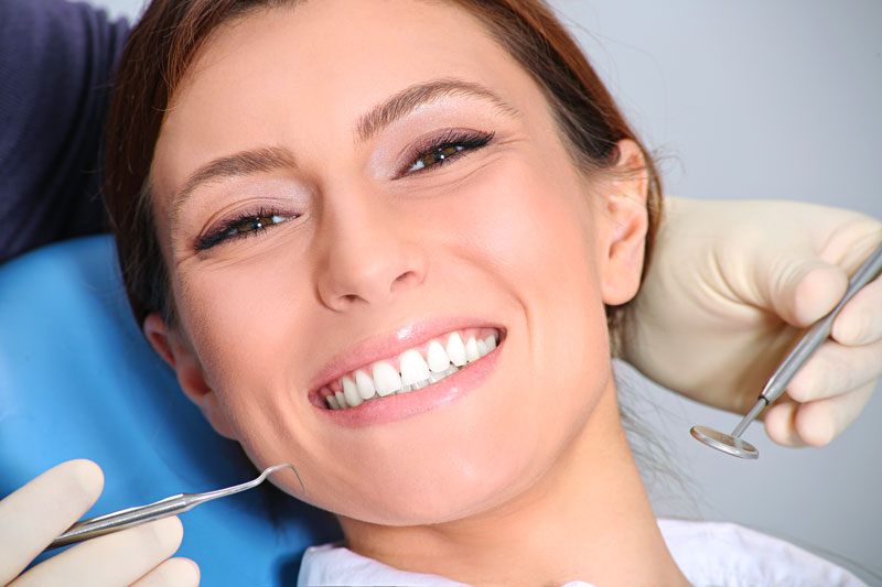 A Lady Smiling After Cosmetic Dental Treatment in Burlington, ON
