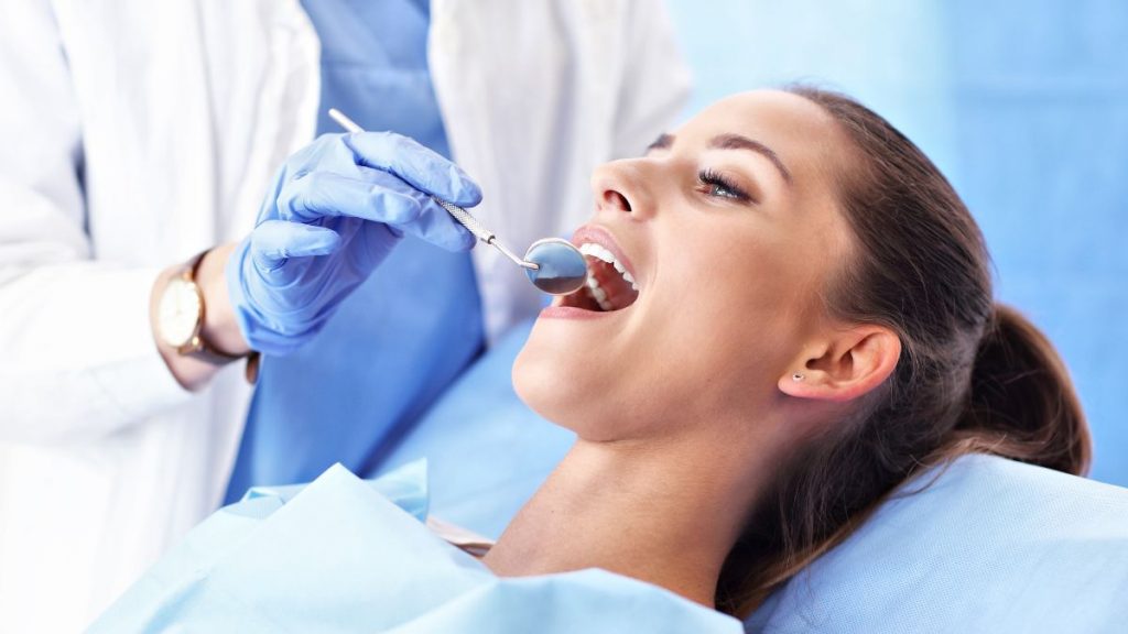 Woman Undergoing Root Canal Treatment