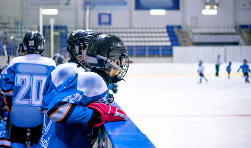 Hockey Player Using a Sports Mouth Guard